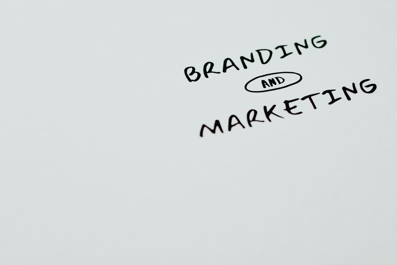 Home A minimalist image featuring the words 'Branding' and 'Marketing' on a white background, ideal for digital marketing themes.